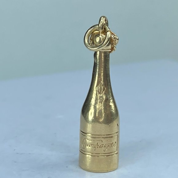 14K yellow gold Champagne bottle 3.0g 28x7.63mm